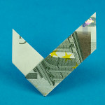 Häckchen Origami Häckchen aus einem Geldschein