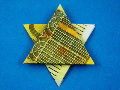 Origami Sechszackstern aus einem Geldschein