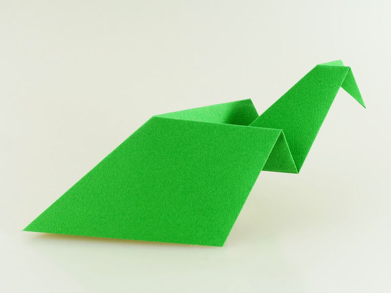 Origami Pfau aus grünem Origami-Papier